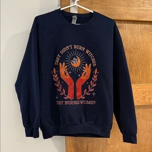 “They didn’t burn witches, they burned women” navy sweatshirt